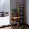 indoor-bar-beverage-display-stand-03 Minimal wooden wine corner with integrated shelving and seating, designed for intimate wine tasting and modern lifestyle interiors.