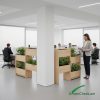 Modern wooden modular indoor planter divider with integrated greenery and soft LED lighting, designed for cafés, offices, and lifestyle interiors.